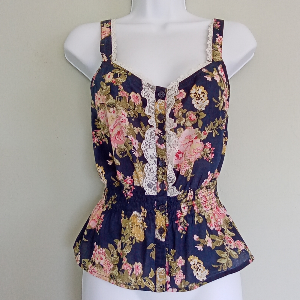 Navy blue and floral peplum top with lace detail